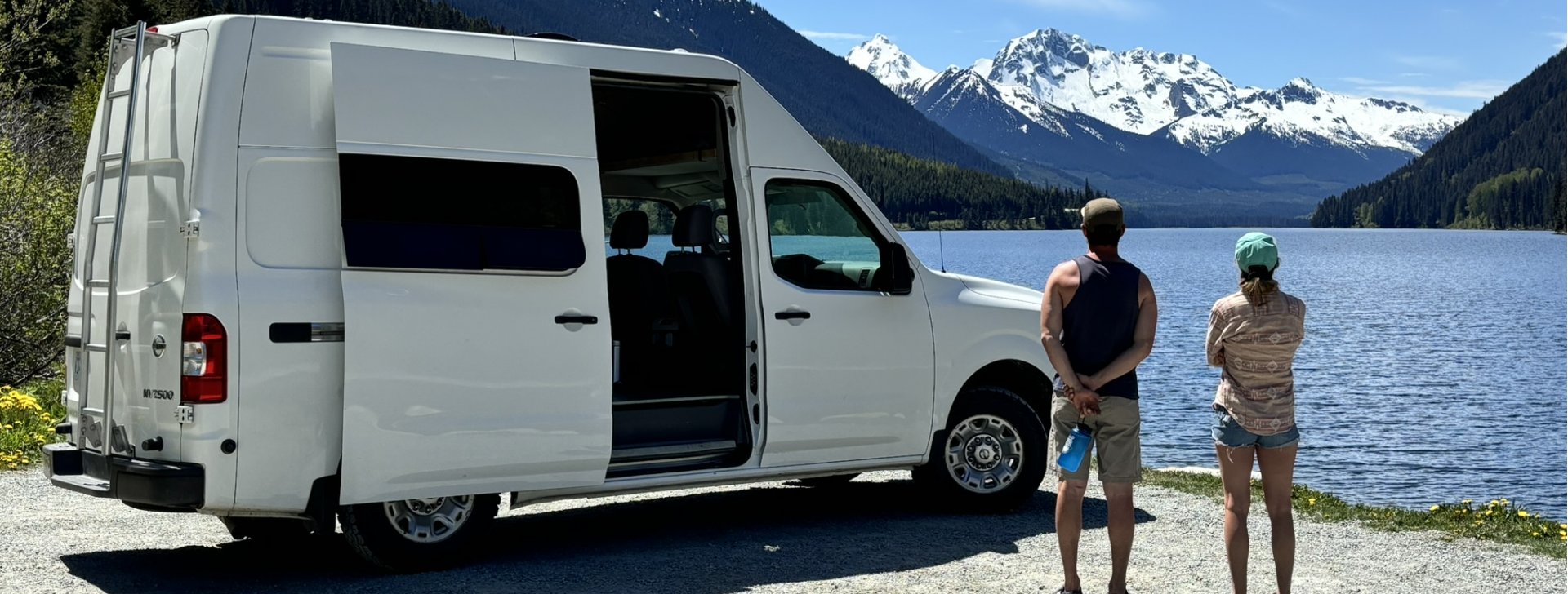 TryVanLife campervan rental parked by a lake with mountain views in Whistler